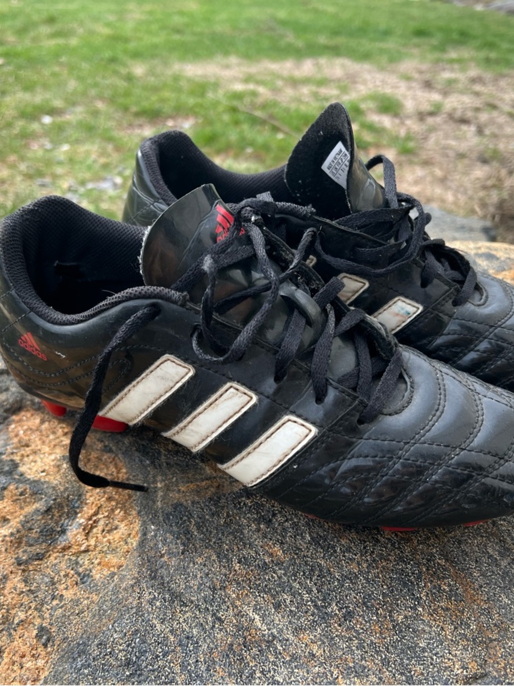 Adidas Youth Black Football Cleats with White Stripes